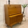 Vintage Sekretär, helles Eichenholz, eckig, schlicht, beleuchtet, Türen, Schubladen, Mid Century Möbel, Designklassiker, 1970er, 60er