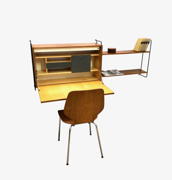 Teakholz Wandsekretär m. Regal Omnia, Hilker, Teak, Regalsystem, Mid Century, Vintage, 1960's, beleuchtet, Schrank, Schreibtisch, hell, schwarzes Metall, Leiterregal, String, Designklassiker, aufklappbar, verschließbar, Safe, homeoffice